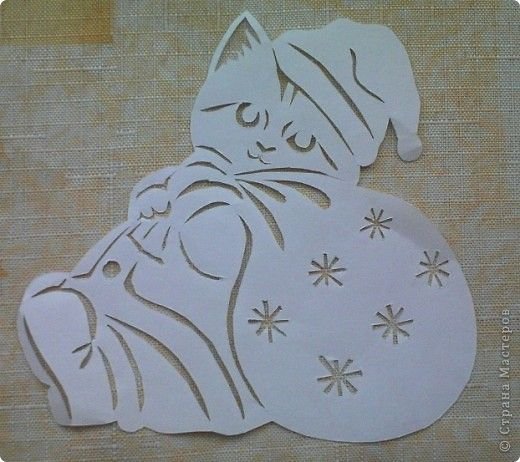 Вырезалки на окна котики