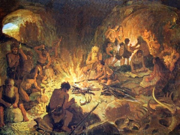 Первобытные люди у костра в пещере