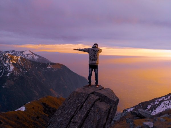Man looks Sunset Mountains