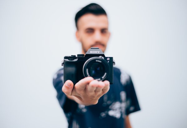 Парень с фотоаппаратом