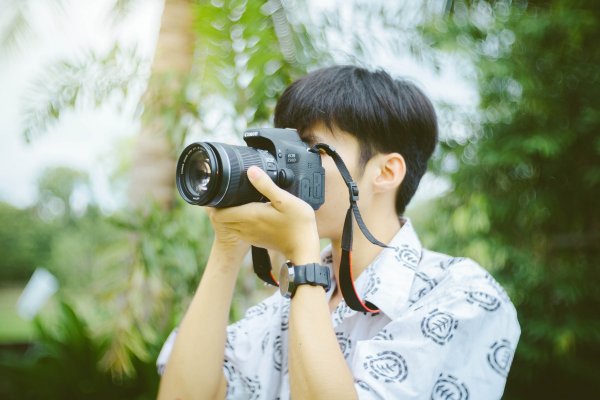 Фотограф с фотоаппаратом